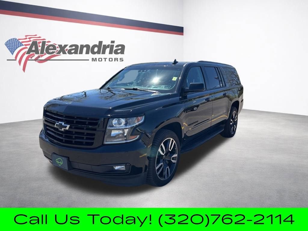 2019 Chevrolet Suburban Premier in Black — front three-quarter view